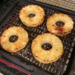 Pineapple rings air fried on fryer tray