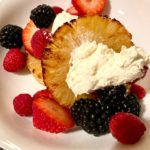 Air fryer pineapple with berries and whipped cream yogurt