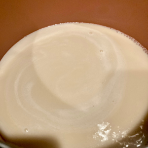 Sweetened Condensed Coconut Milk -Simmering