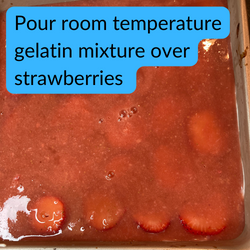 Pour room temperature gelatin mixture over strawberries
